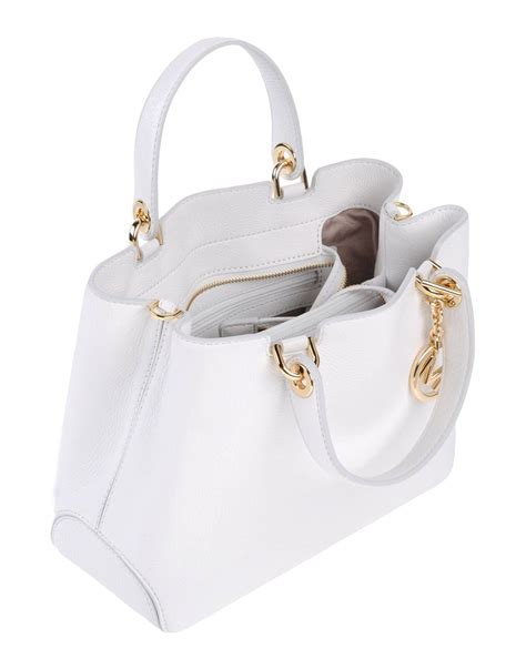 white michael kors bag dirty|Michael Kors hand bag price.